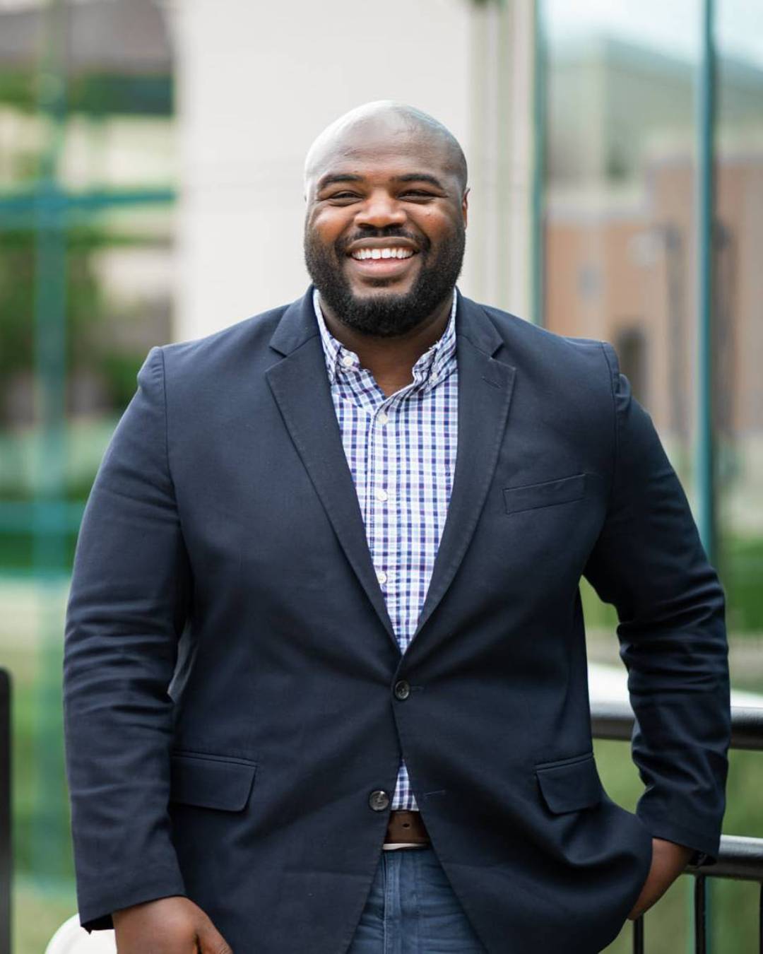 Picture of a man in a suite smiling